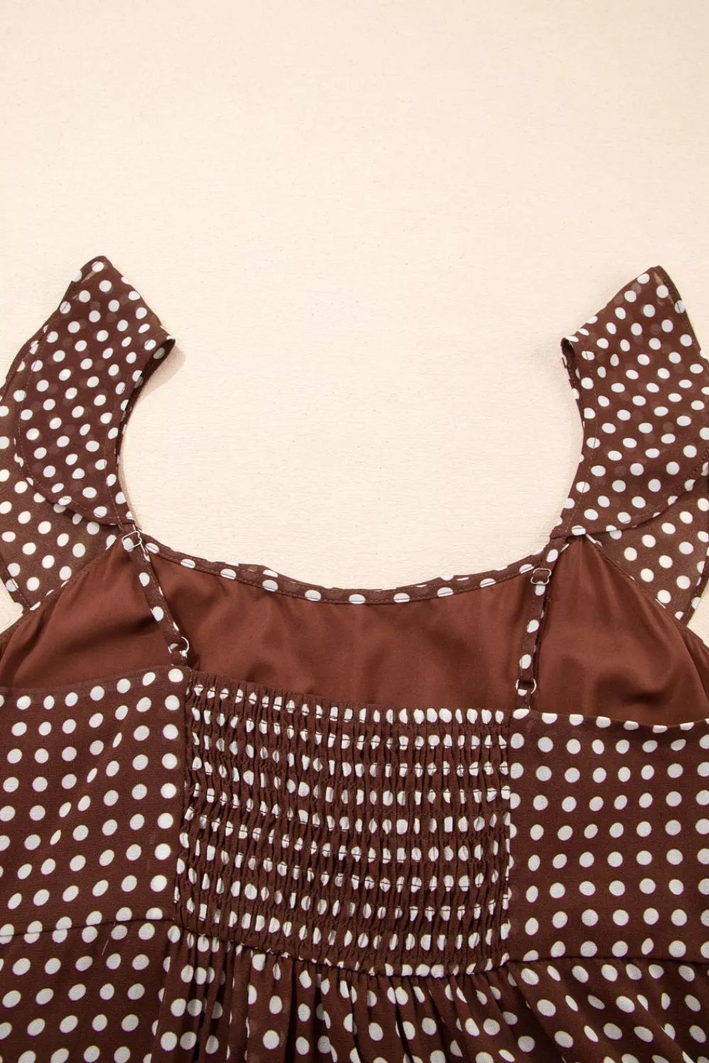 Caramel polka dot backless tiered maxi dress, waist and fit detail