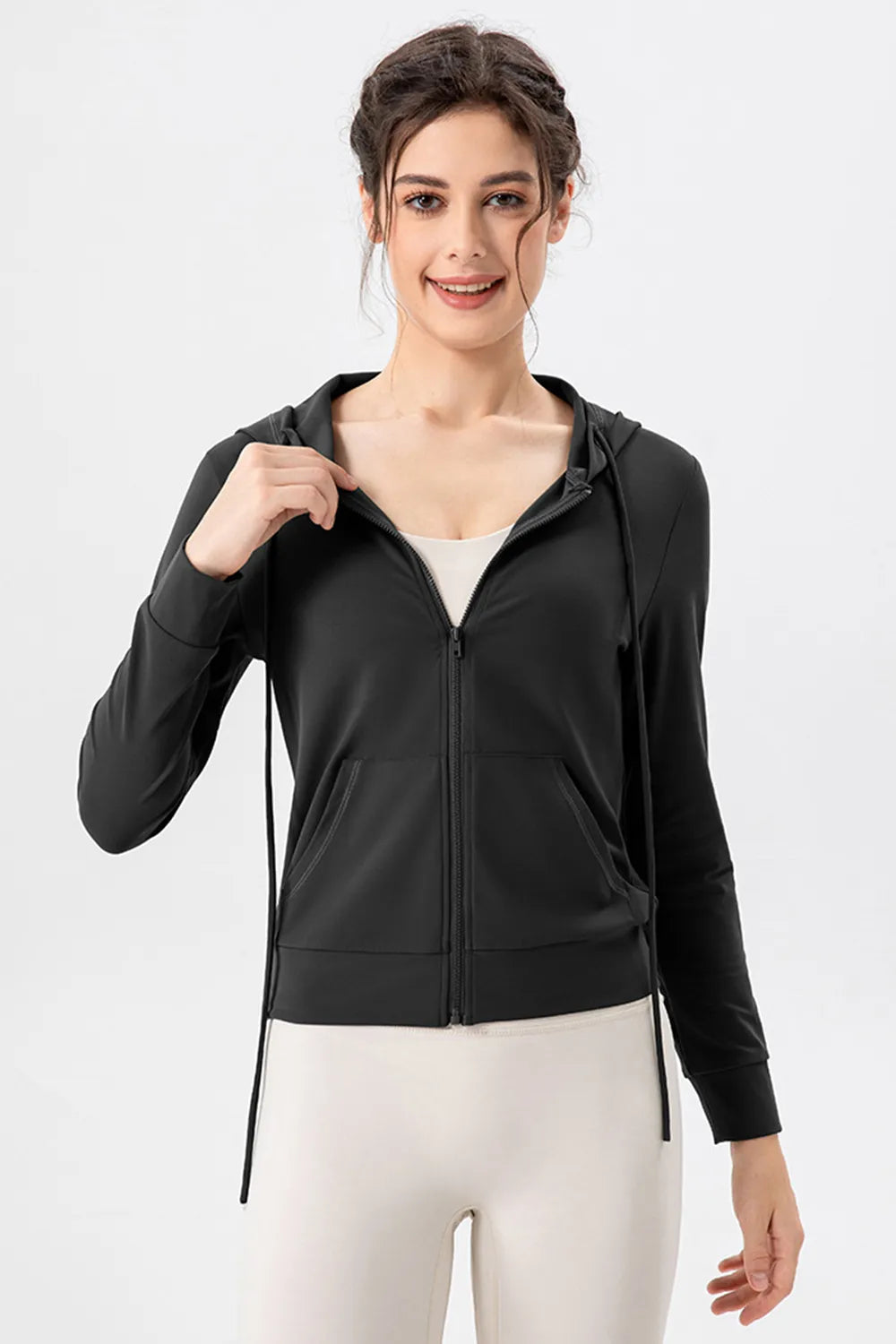 Zip up hooded jacket showing drawstring hood