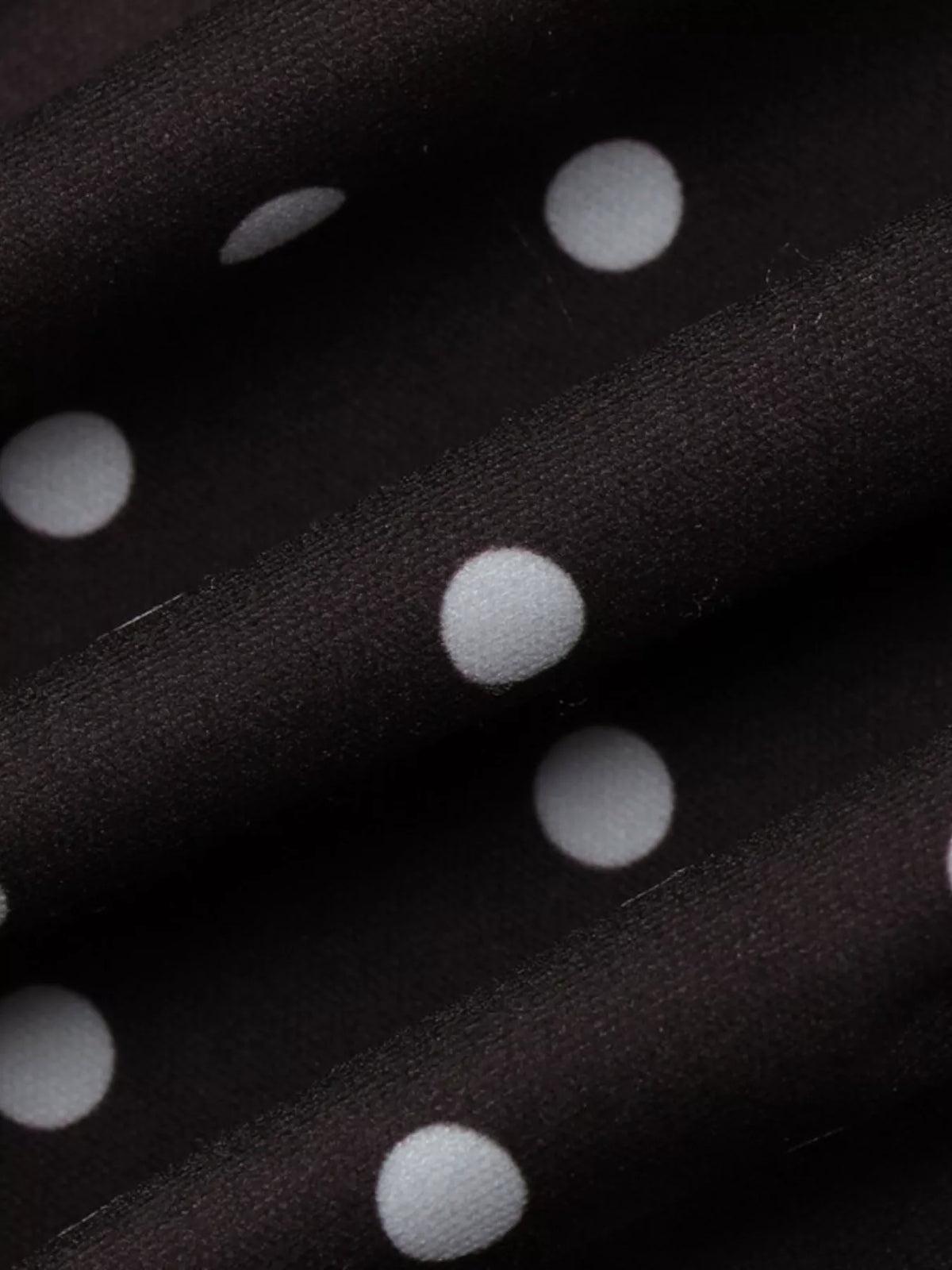 Hem detail on polka dot cutout front mini dress
