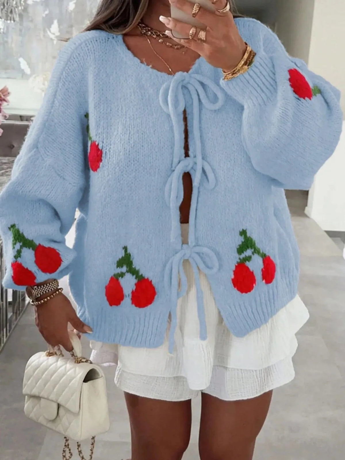 cherry tie front oversized cardigan neckline detail