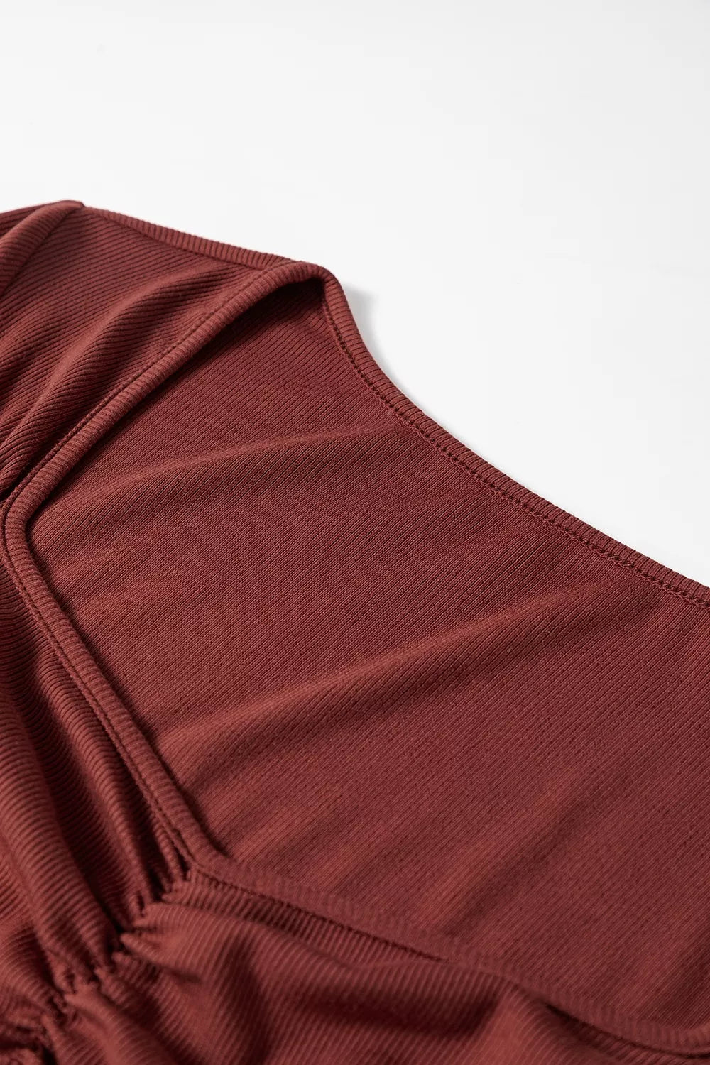 Burgundy top styled with high waisted denim