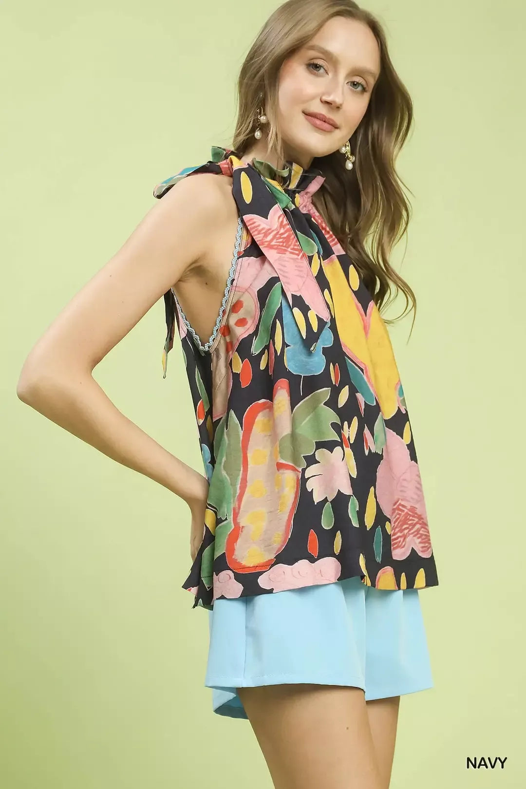 Model wearing the halter neck top