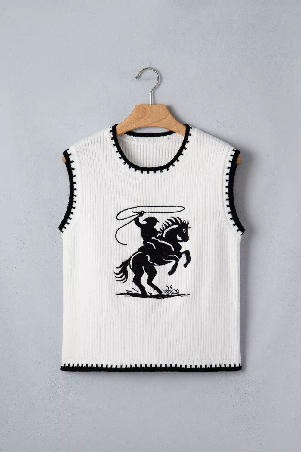 Sleeveless western rodeo vest styled with denim