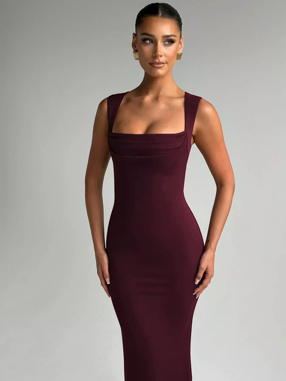 Side profile of the long square neck dress