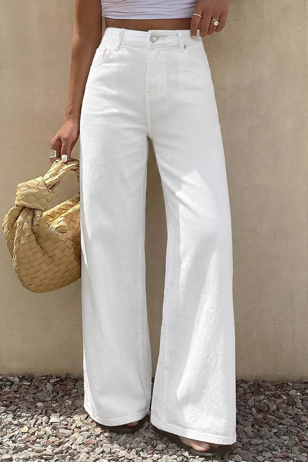 Womens white loose denim back view