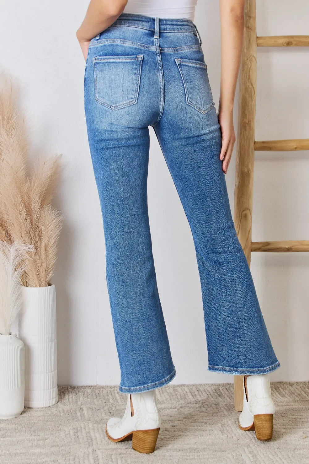 Medium wash flare jeans side view