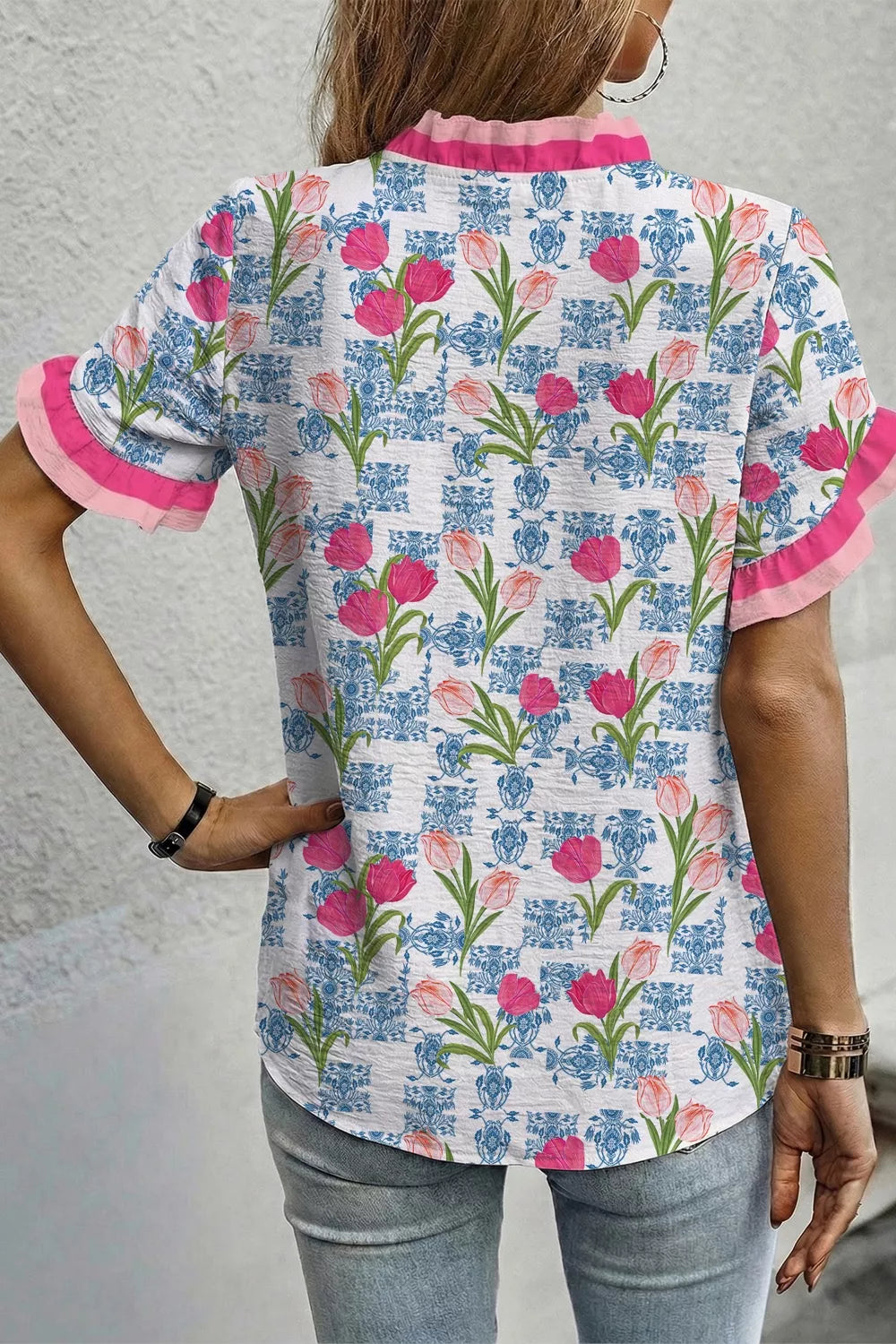 Dusty pink floral ruffle V neck short sleeve tunic front view