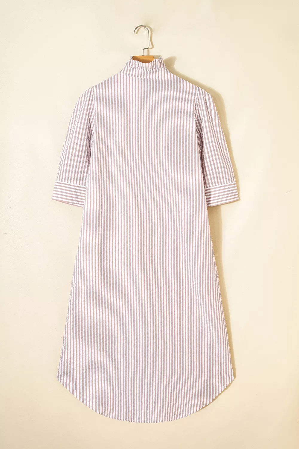 Striped shirt dress belted at the waist
