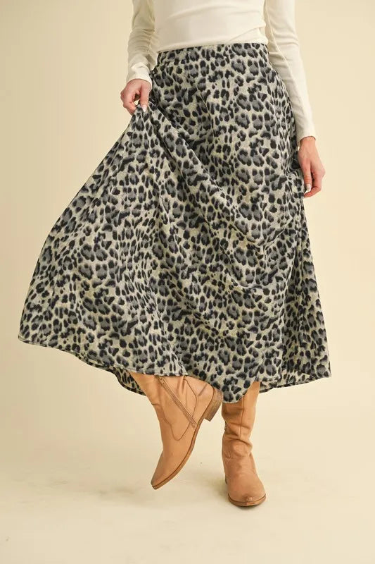Leopard print midi skirt styled on model