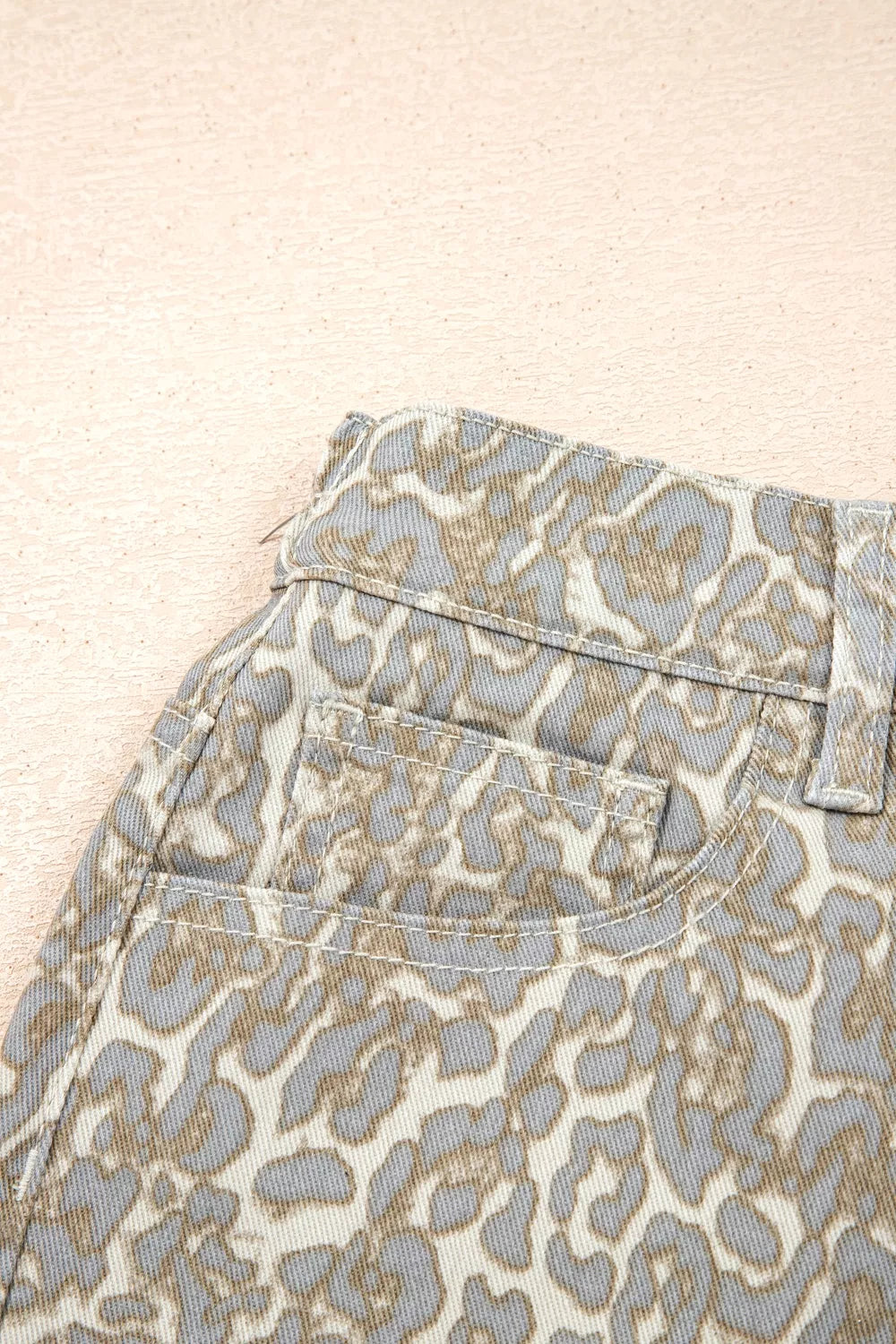 Khaki leopard print raw edge denim shorts styled view