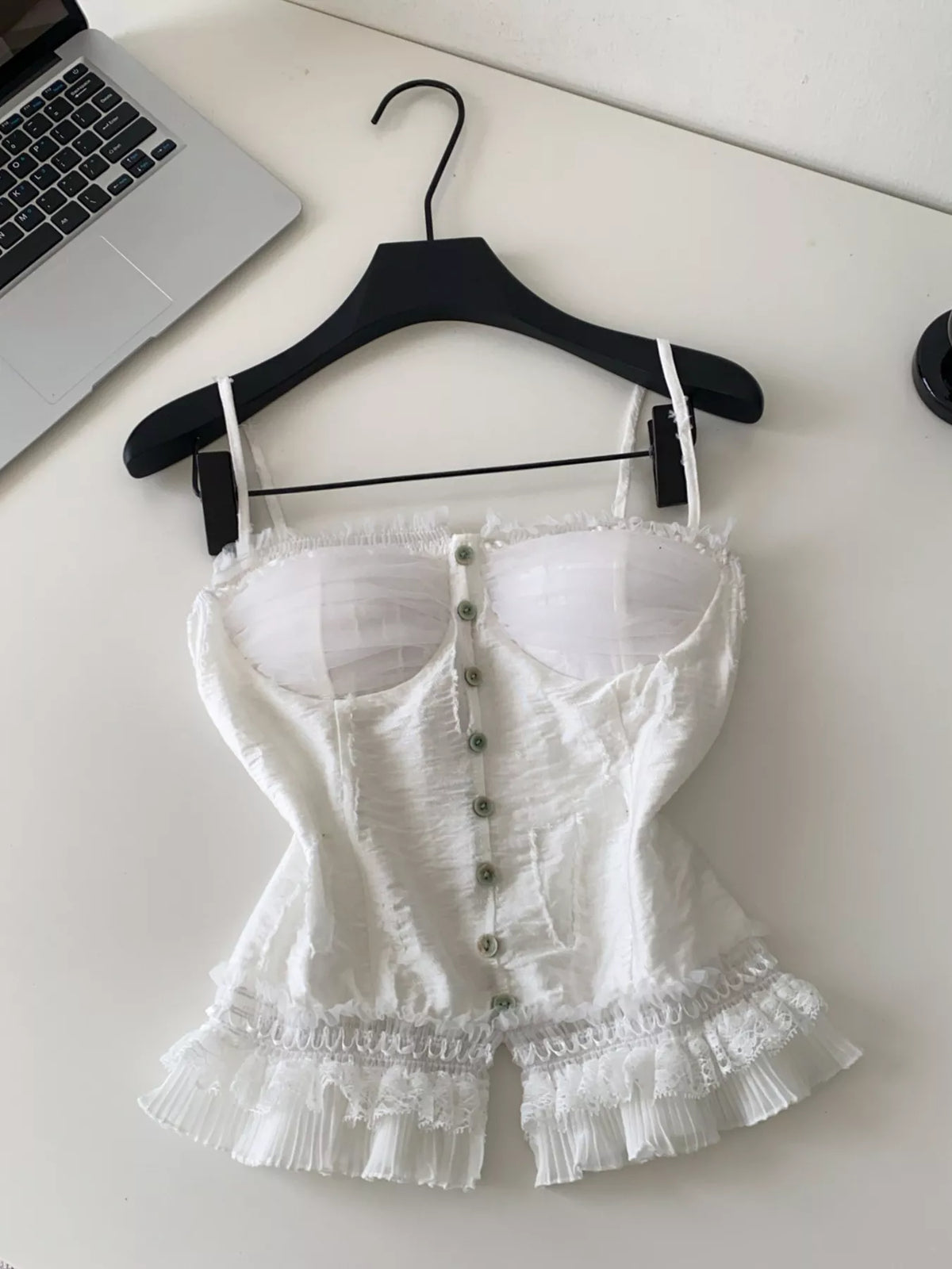 Ruffle hem tank close up of lace