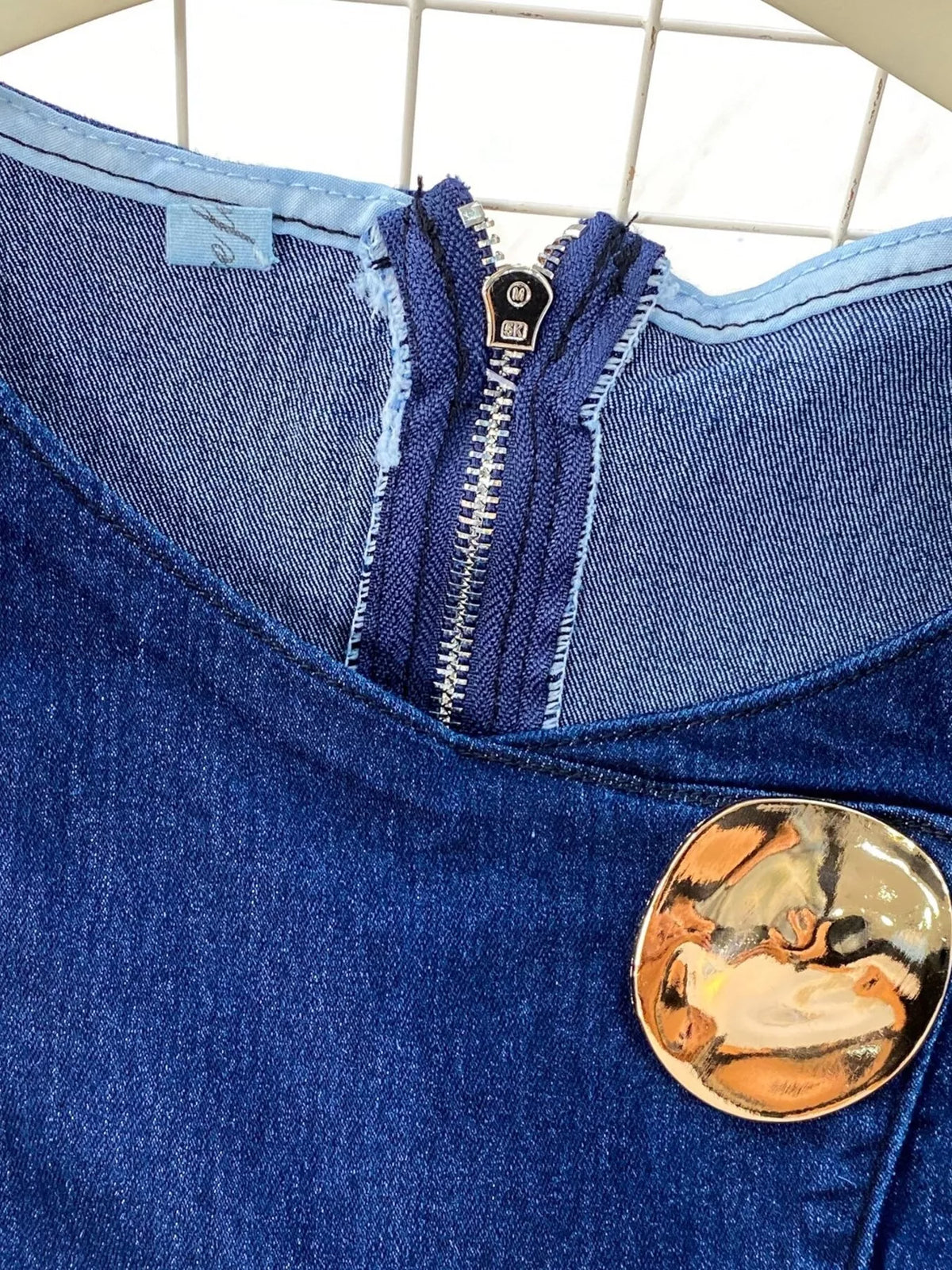 Denim vest and jeans set back view