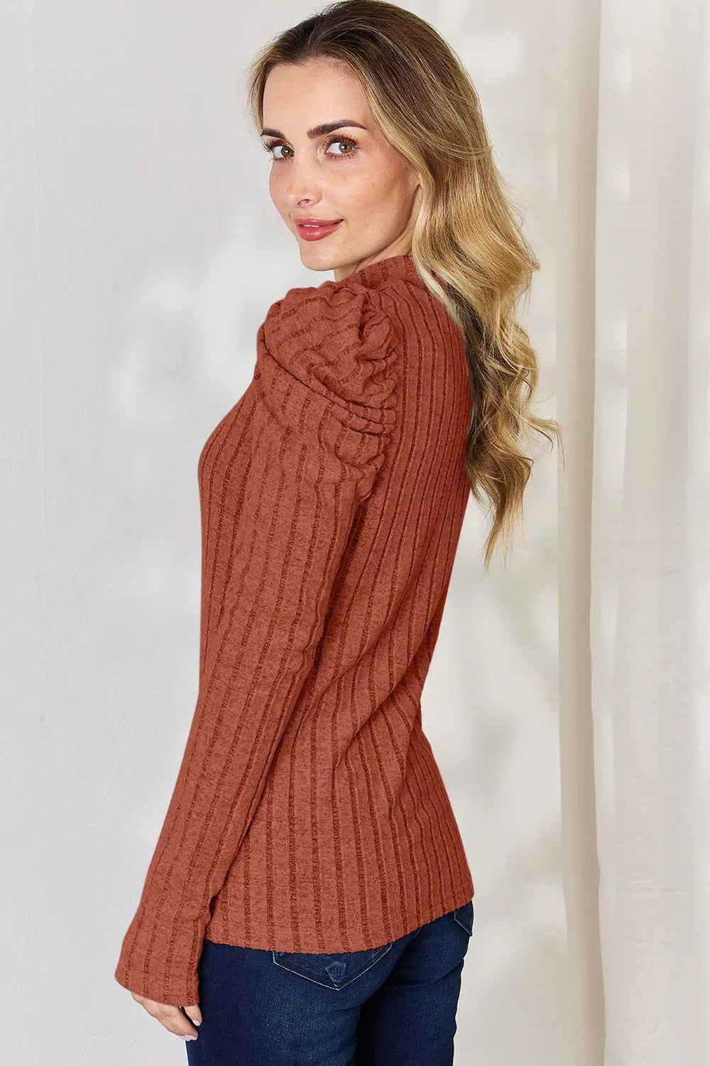 Ribbed mock neck top styled on model