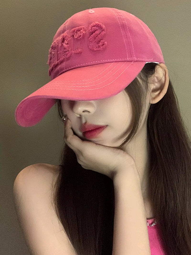 Frayed letter baseball cap in cotton front view