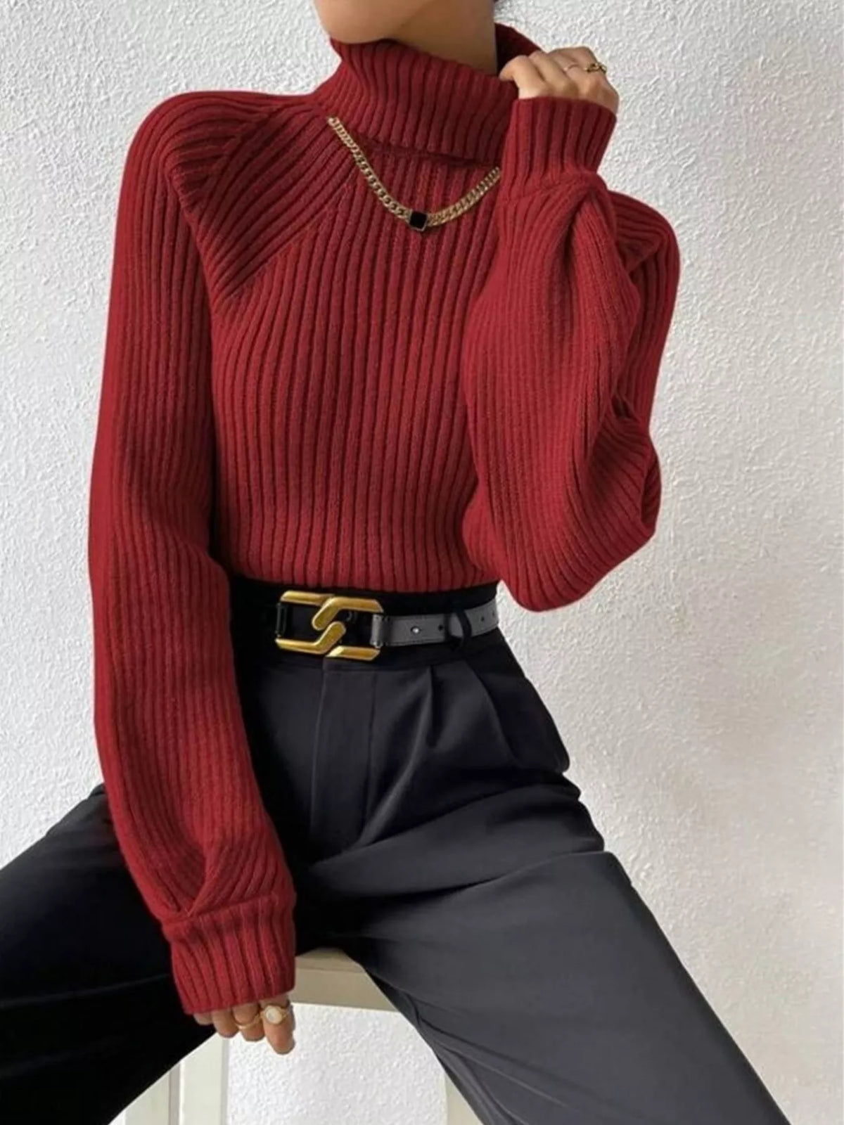 Fitted turtleneck knit sweater side view
