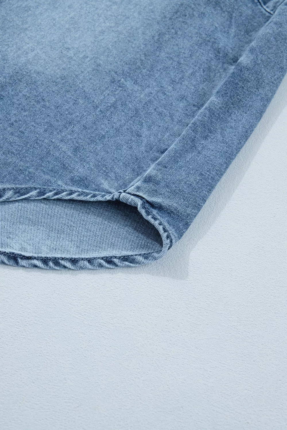 Medium wash frilled snap button denim shirt back view