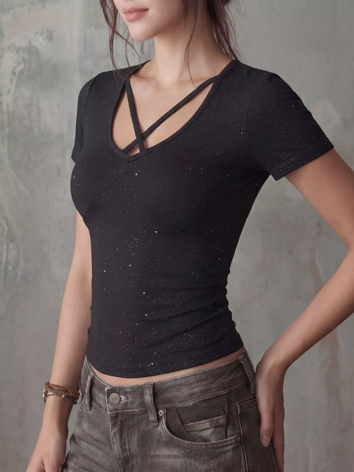Black crossover short sleeve fitted tee side view
