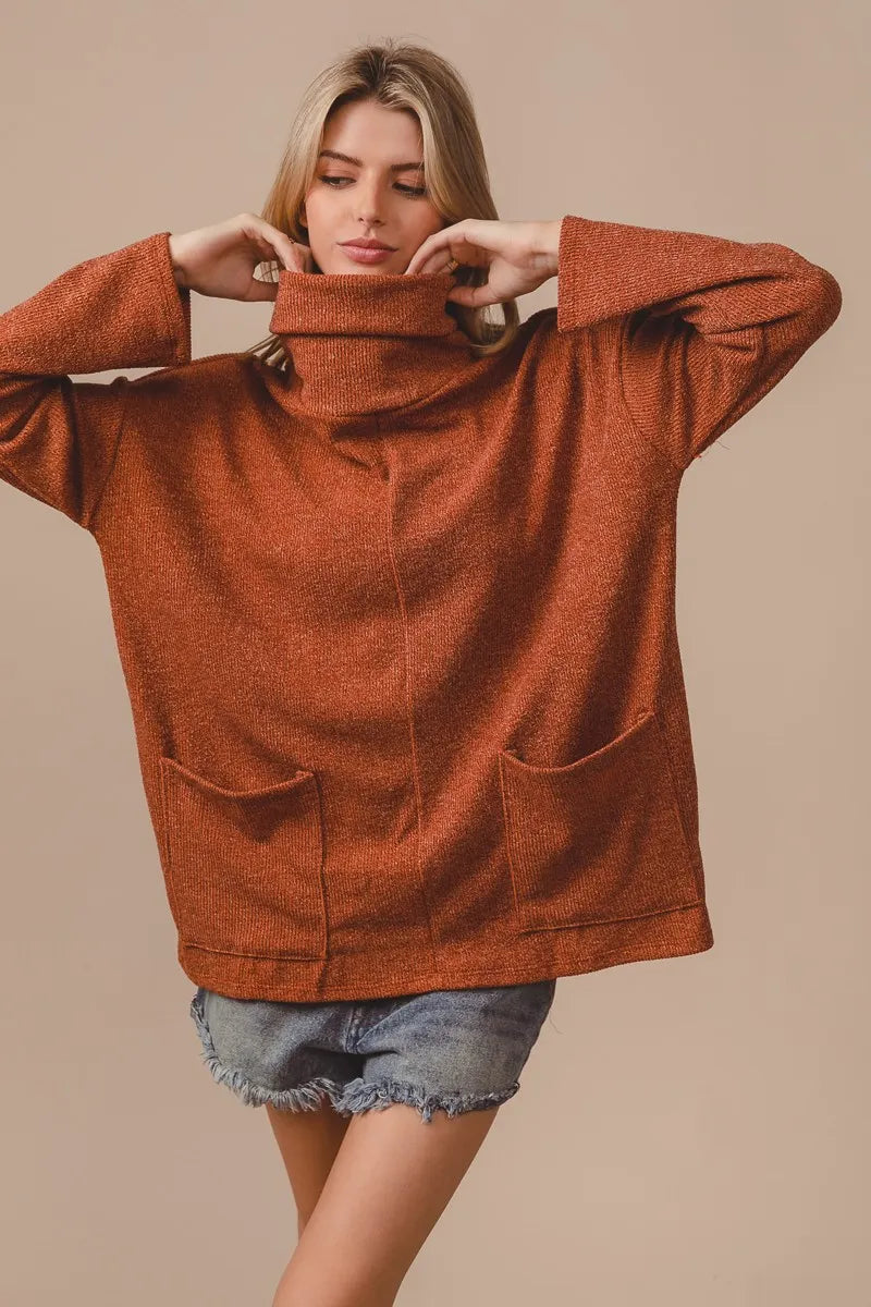 Ribbed Double Pocket Turtleneck Sweater in Rust side view