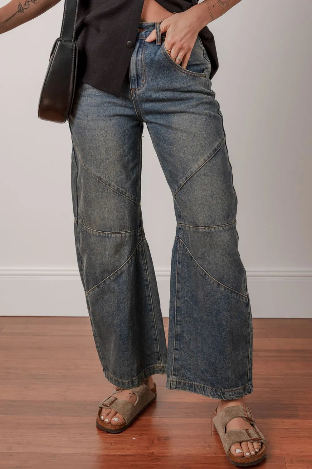 Loose straight jeans exposed stitching detail