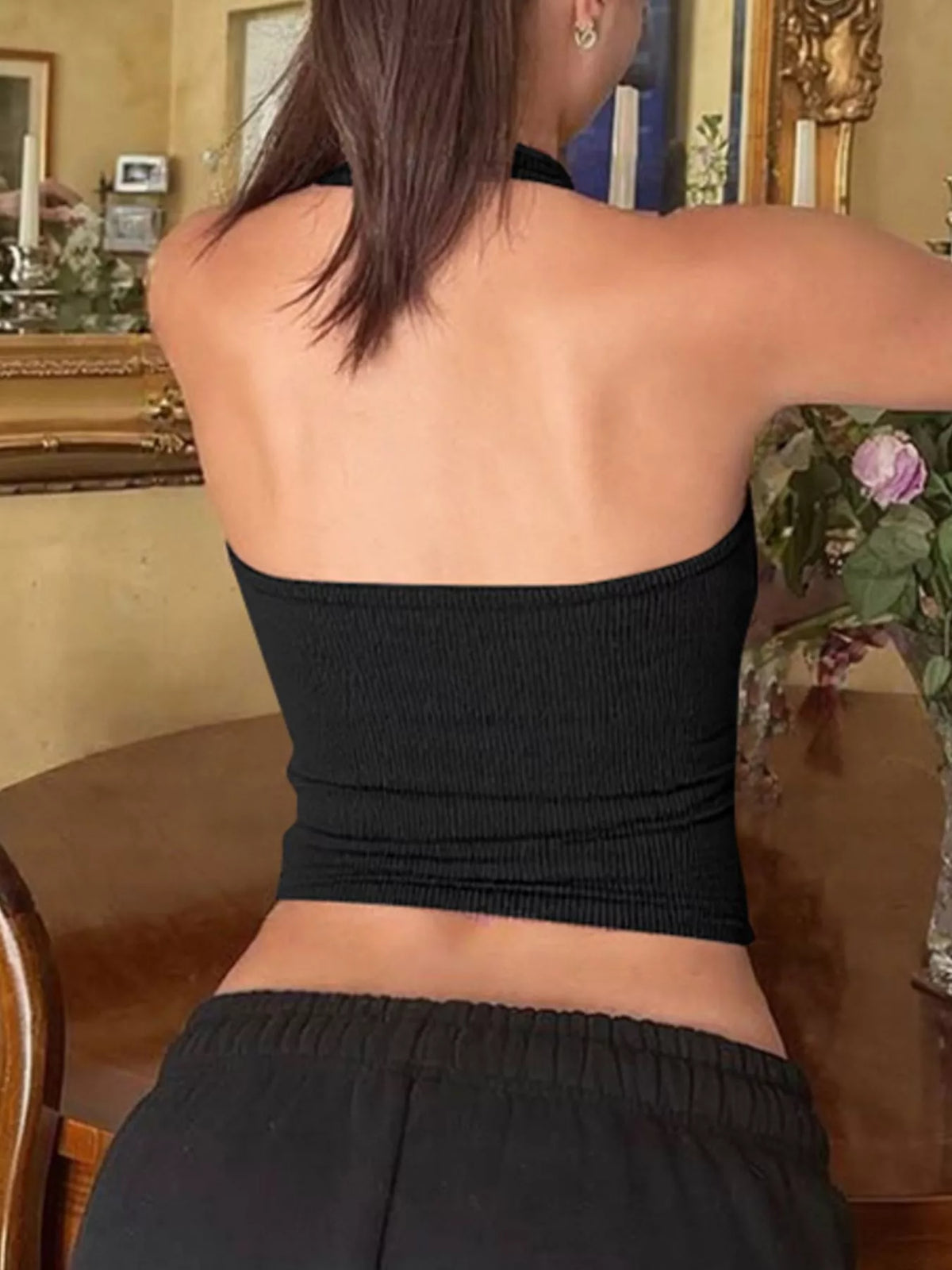 Bare back view of the brown halter neck tank top