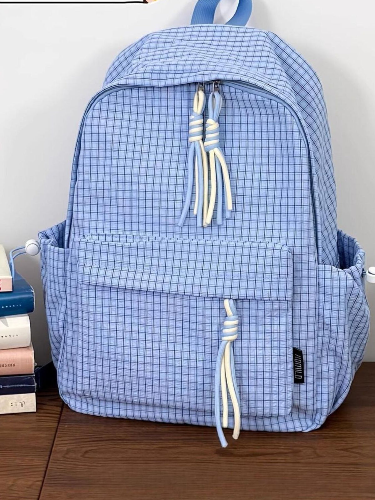 Plaid nylon backpack interior compartment