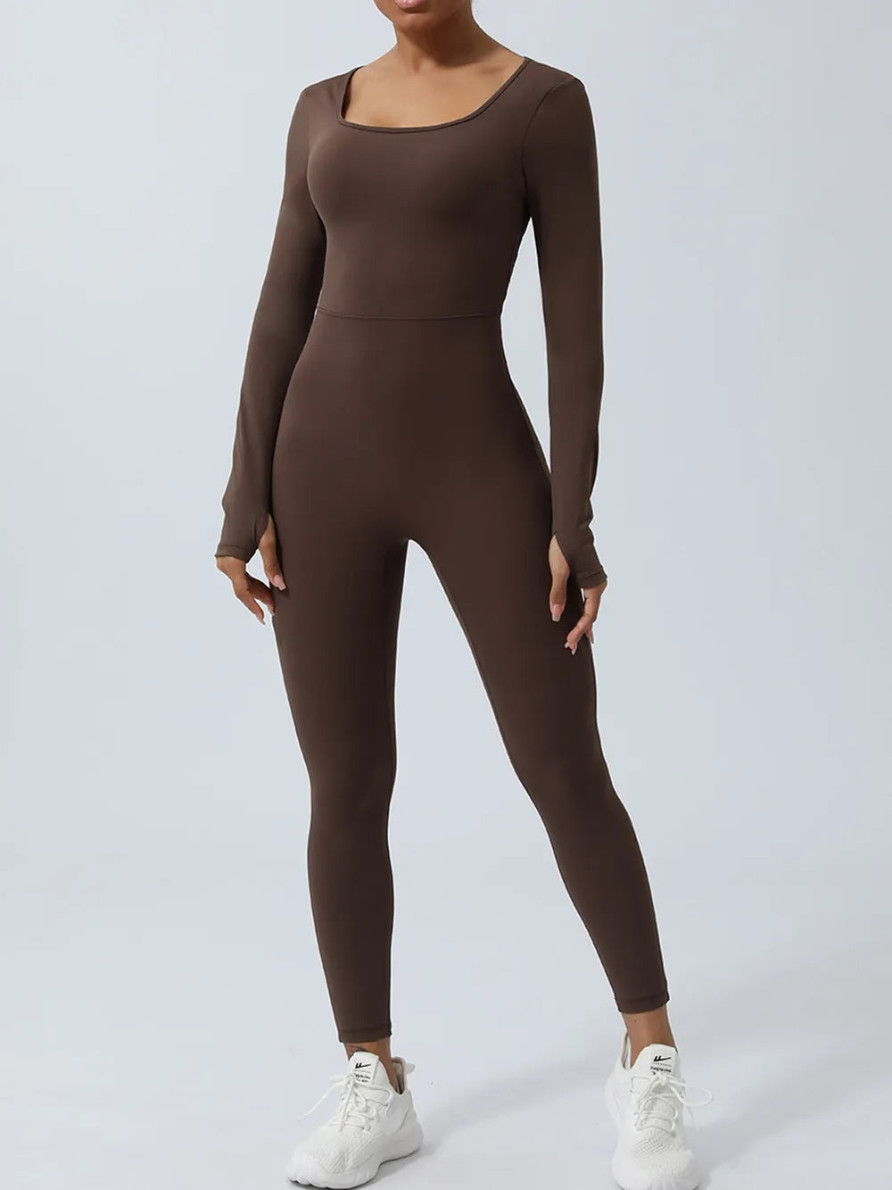 Twisted backless long sleeve jumpsuit styling detail