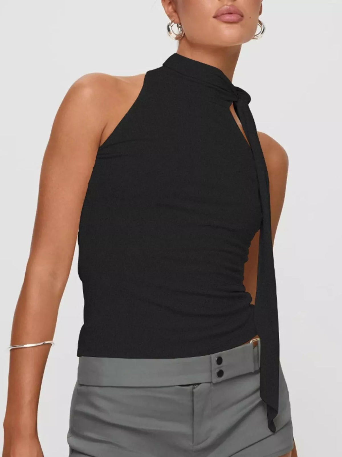 Halter top styled with high waisted jeans