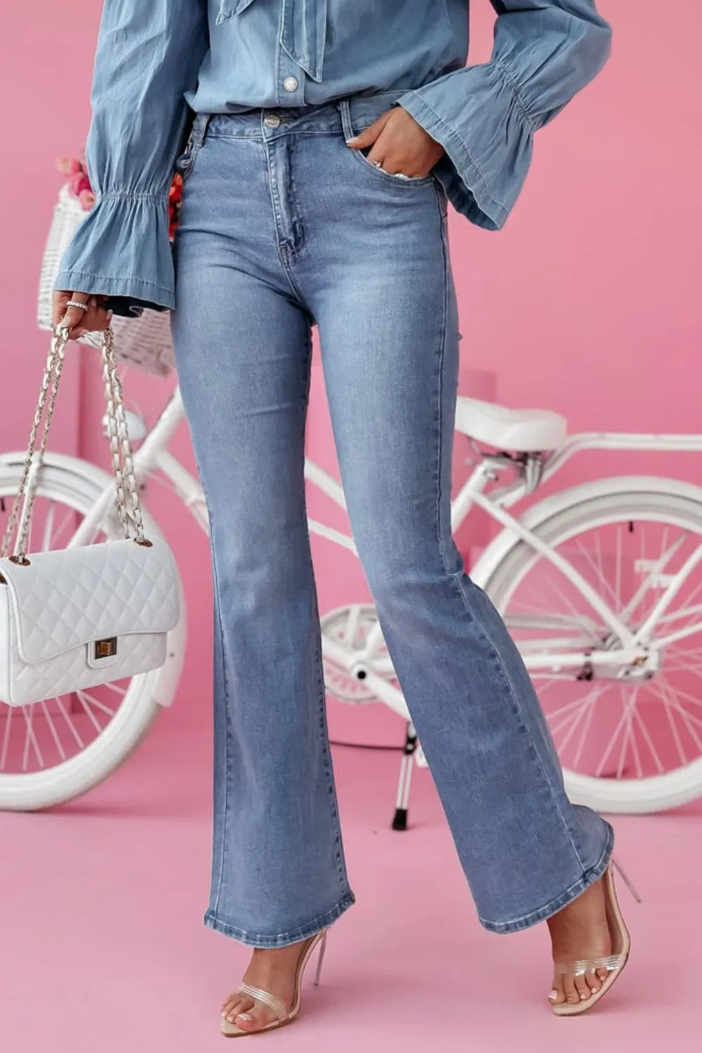 Light wash bootcut jeans front view
