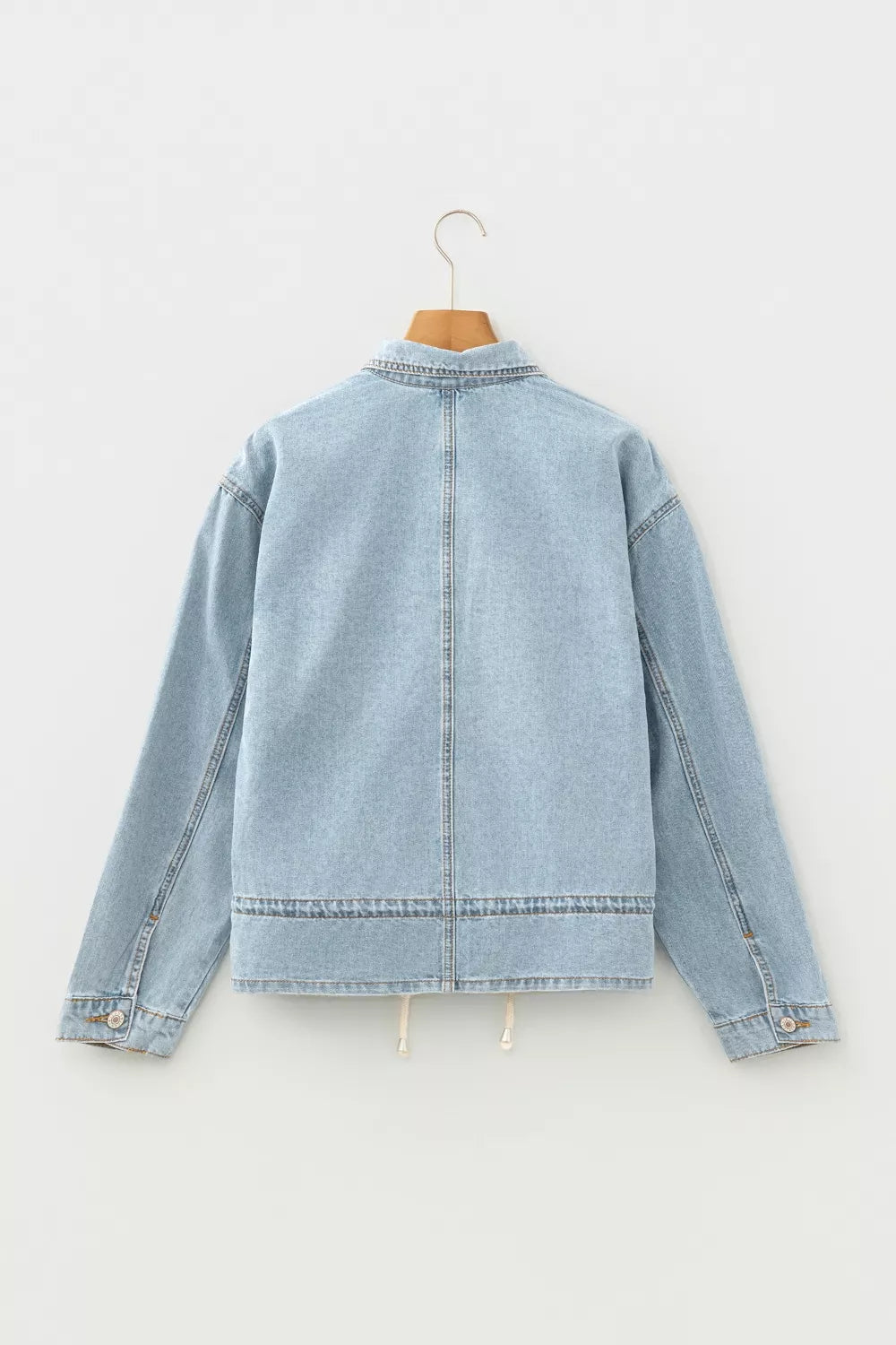 Back view of the cotton denim jacket showing the shoulders