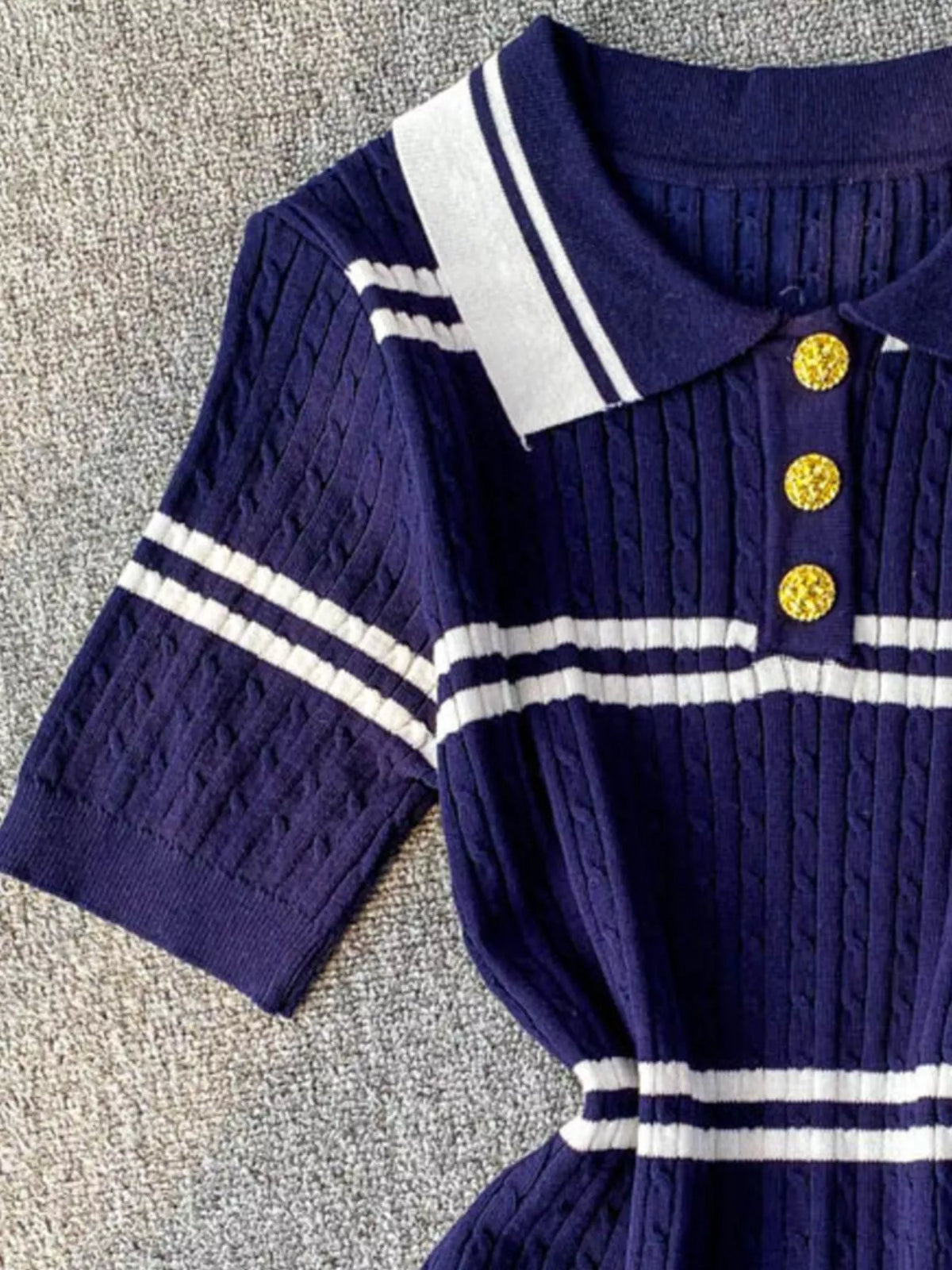 Striped knit polo collar top flat lay view