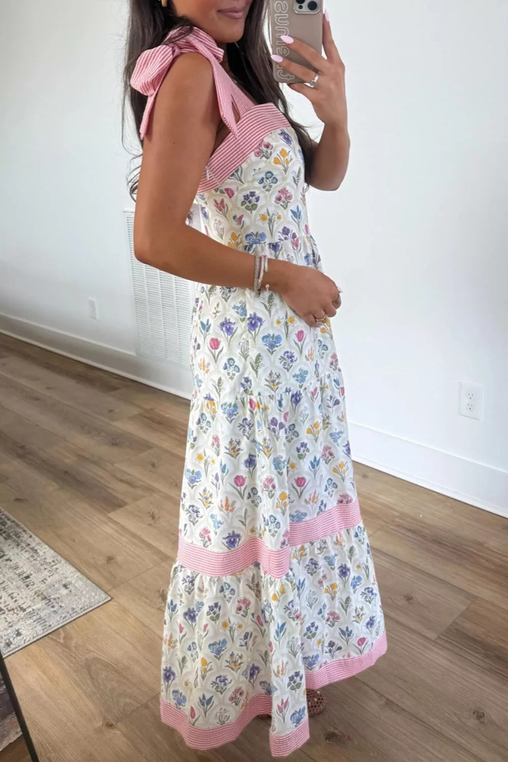 Tie shoulder detail on white floral dress
