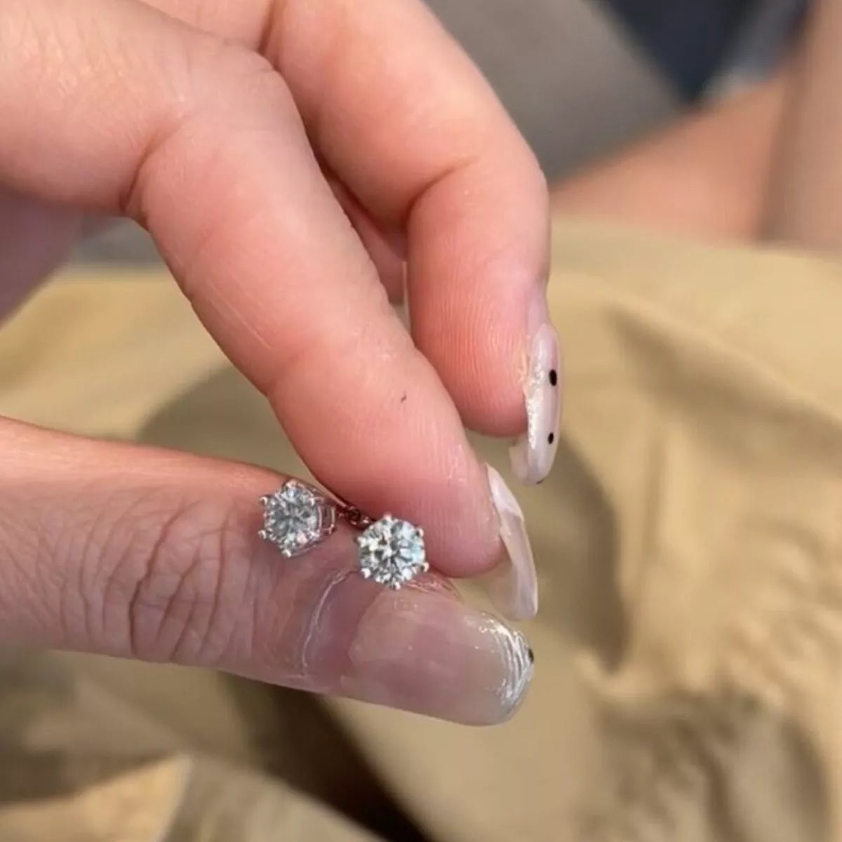 Angled view of the 2 carat moissanite studs