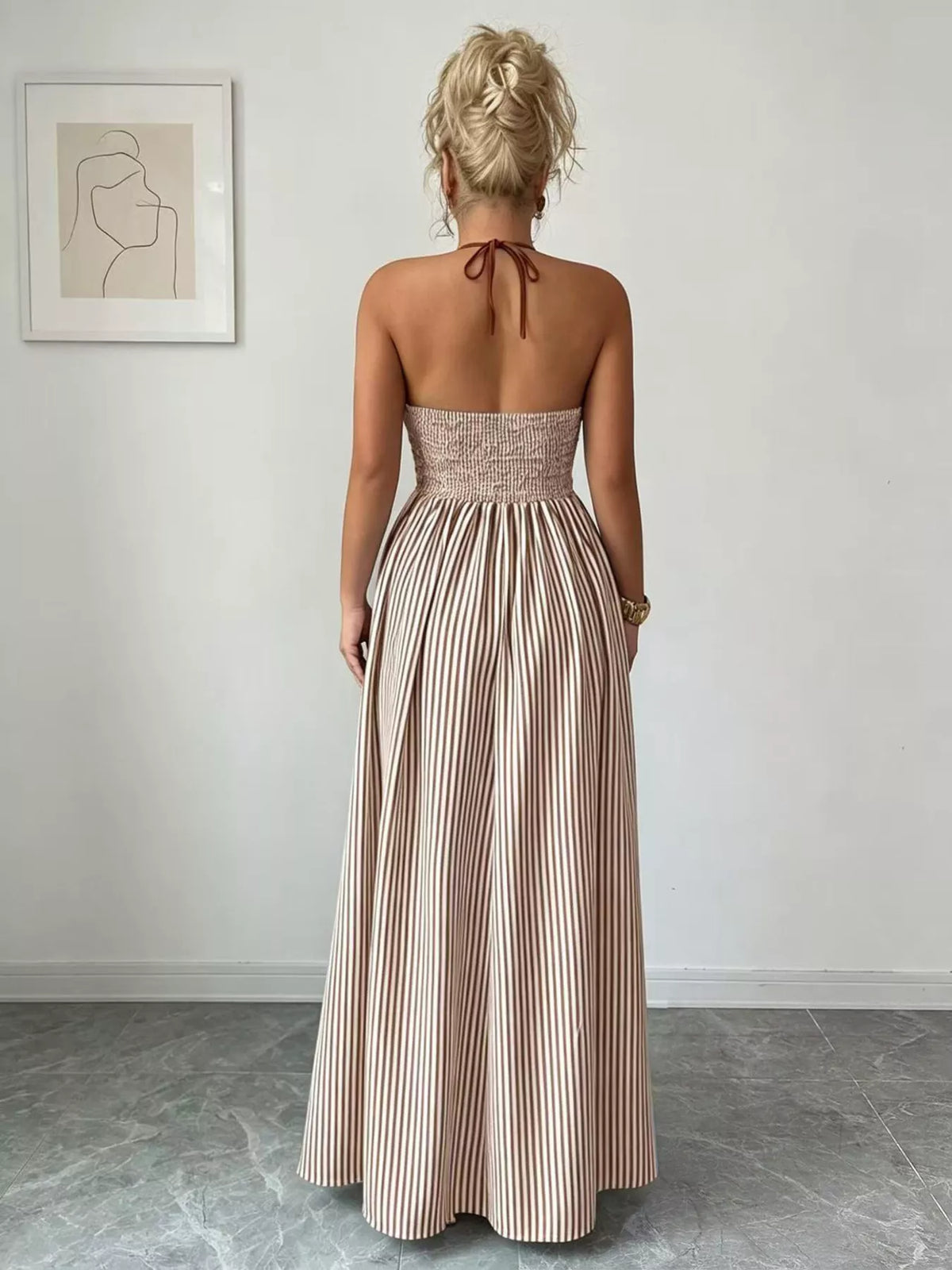 Pink striped smocked maxi dress side view