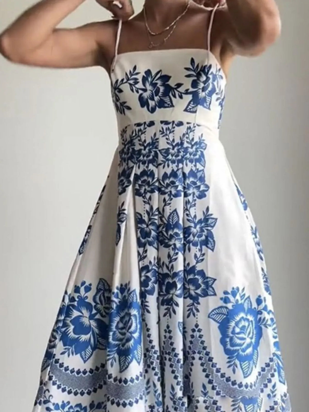 Blue printed spaghetti strap maxi dress detail view