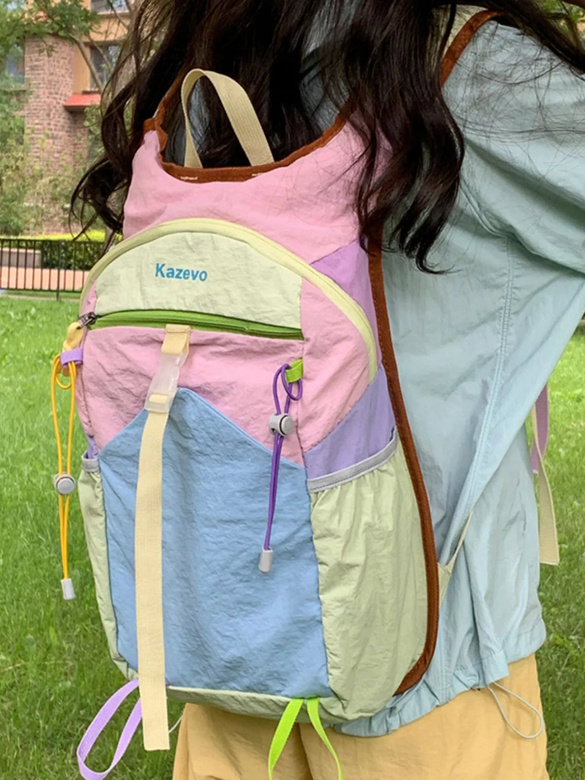 Pastel blue color block backpack side profile