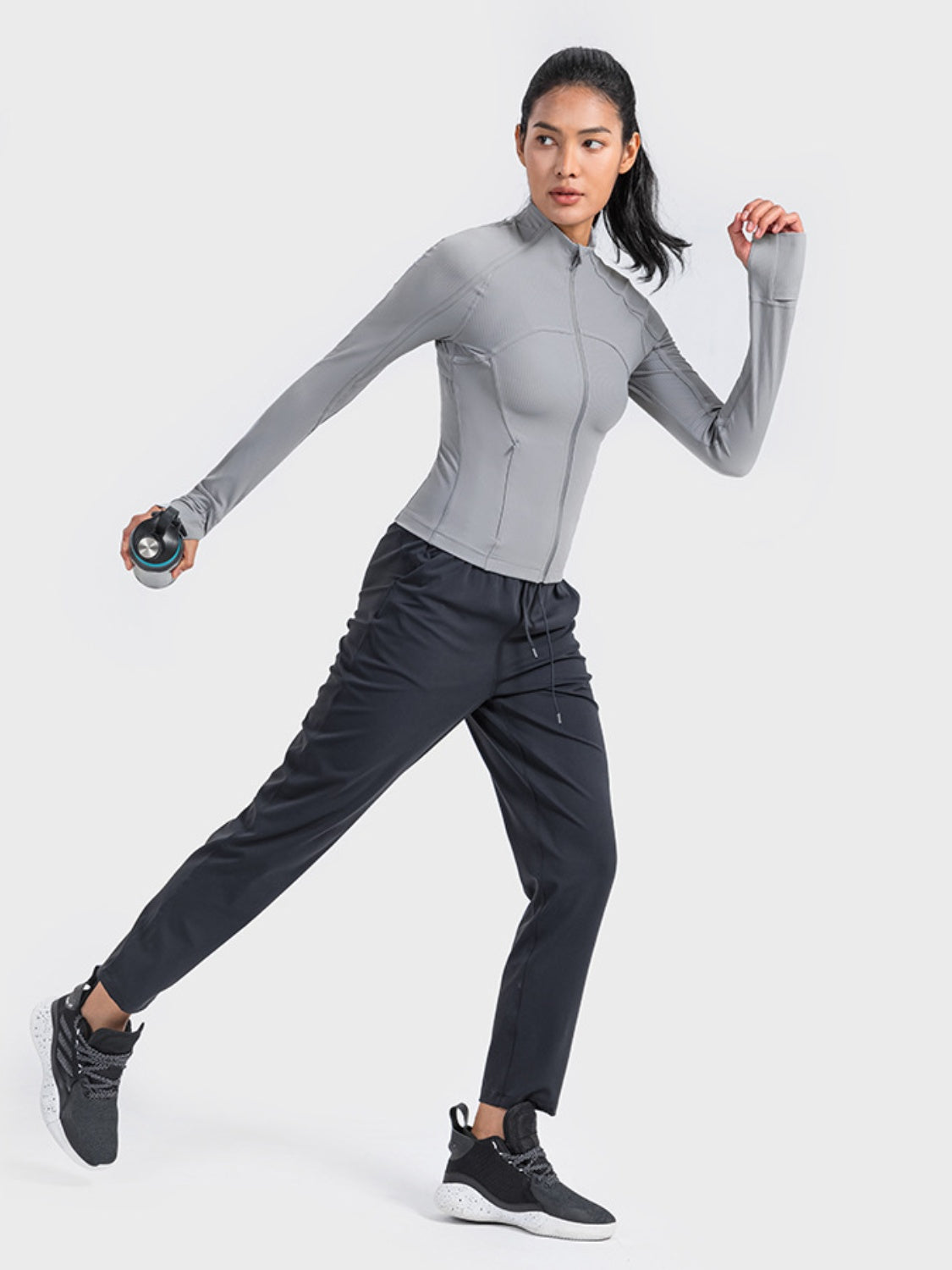 Zip up long sleeve sports jacket back view