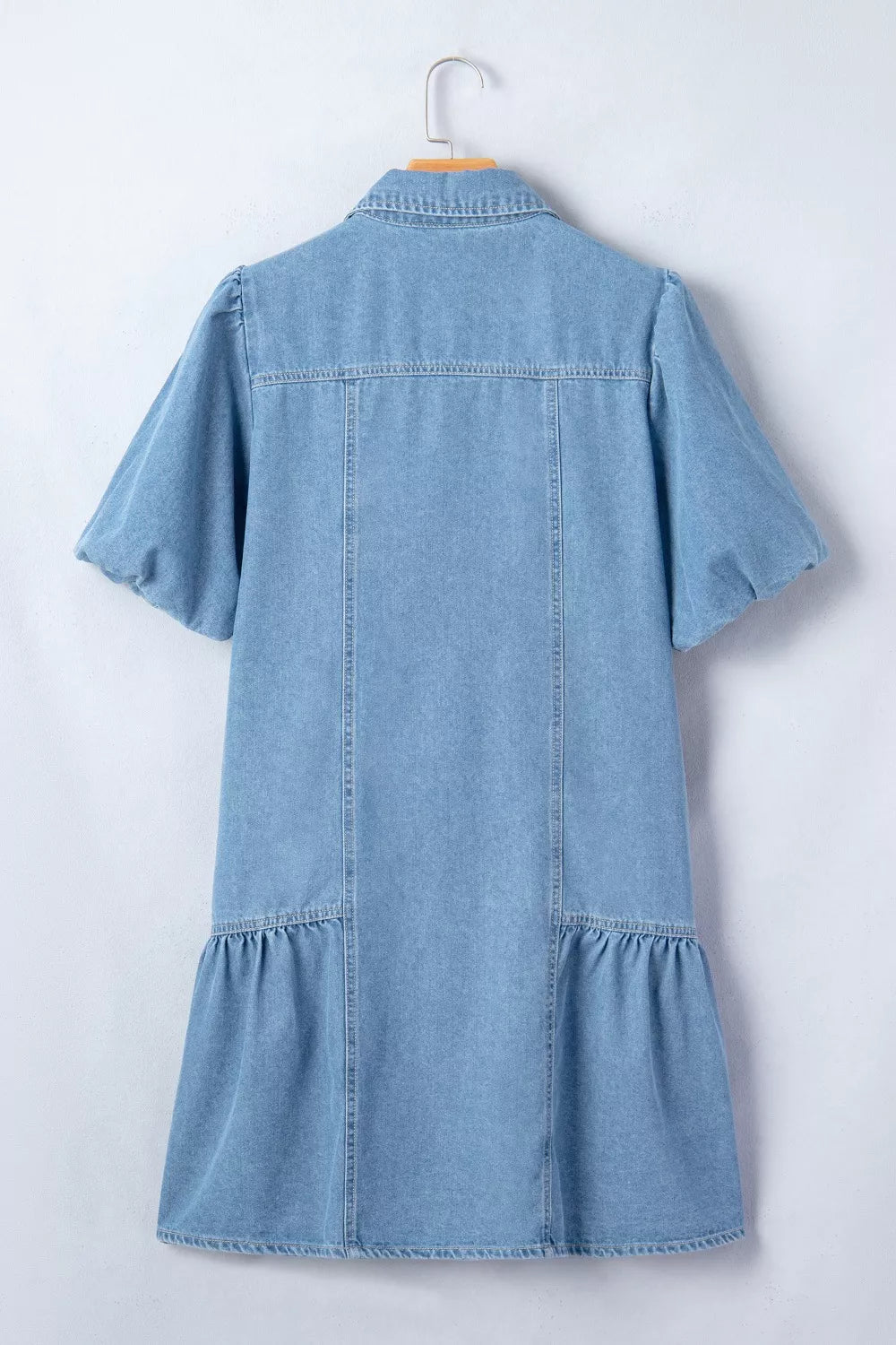 light wash puff sleeve ruffle hem denim dress back detail