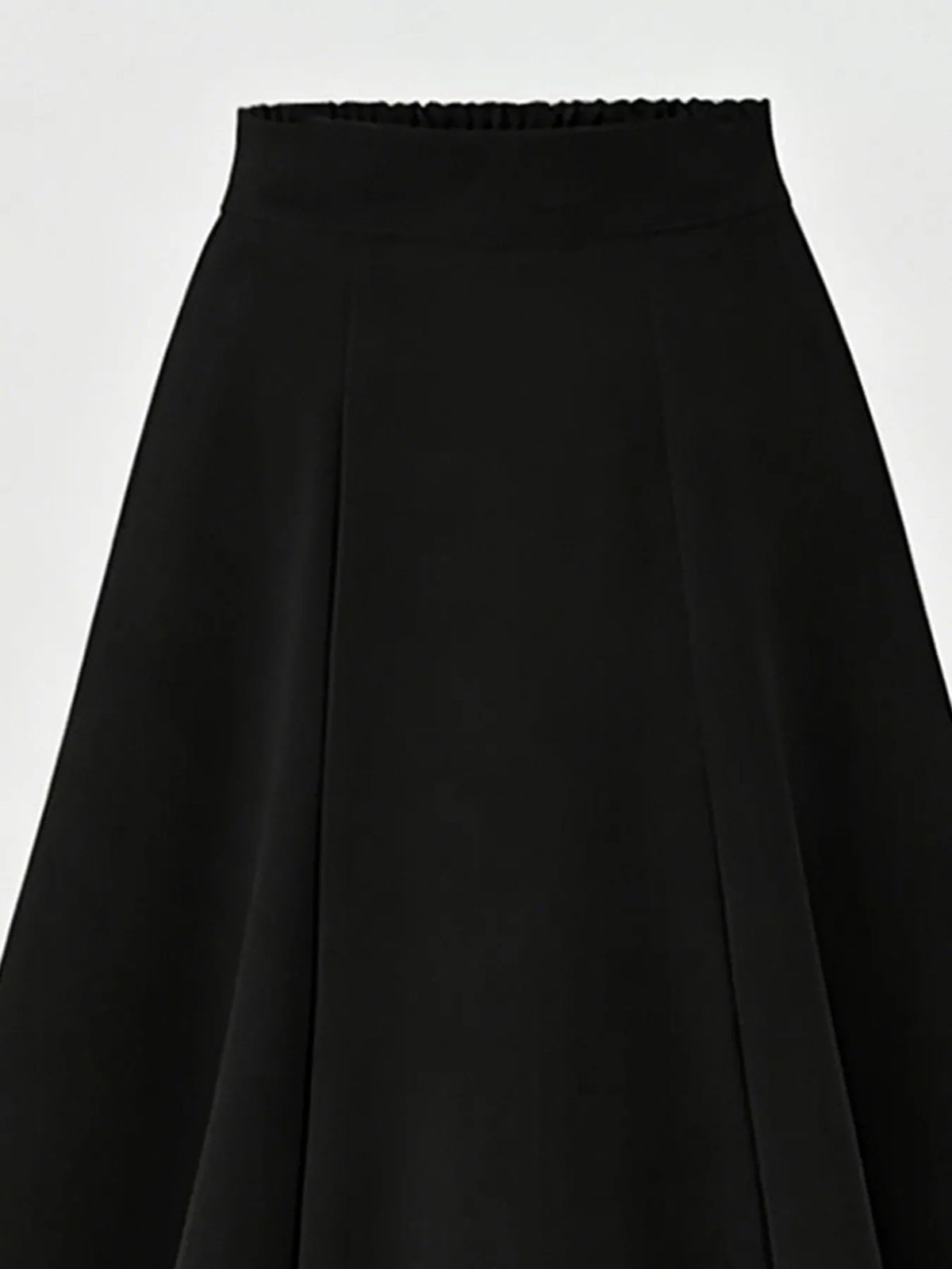 Pleated midi skirt shown in motion