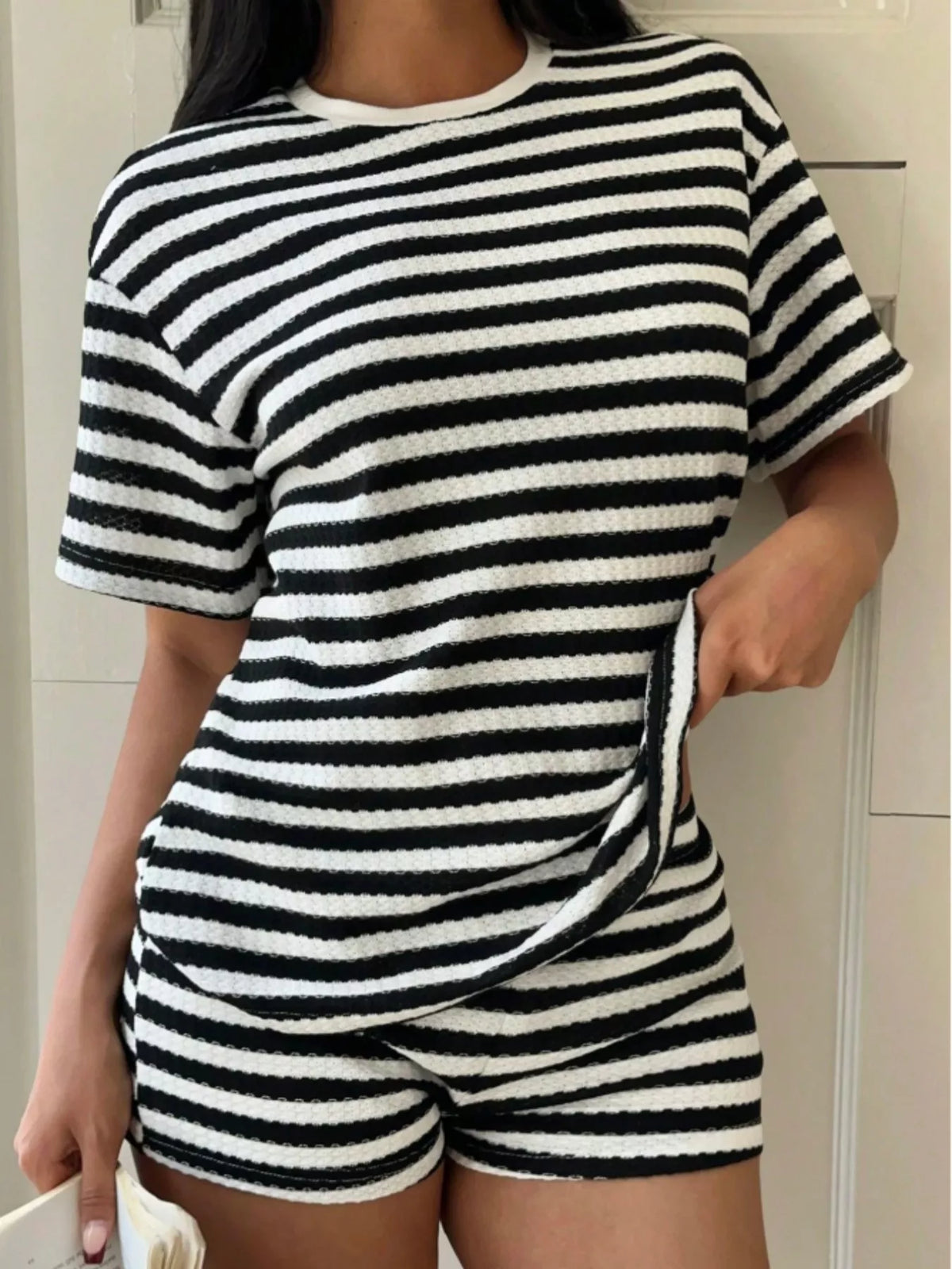 Matching striped round neck top and shorts back view