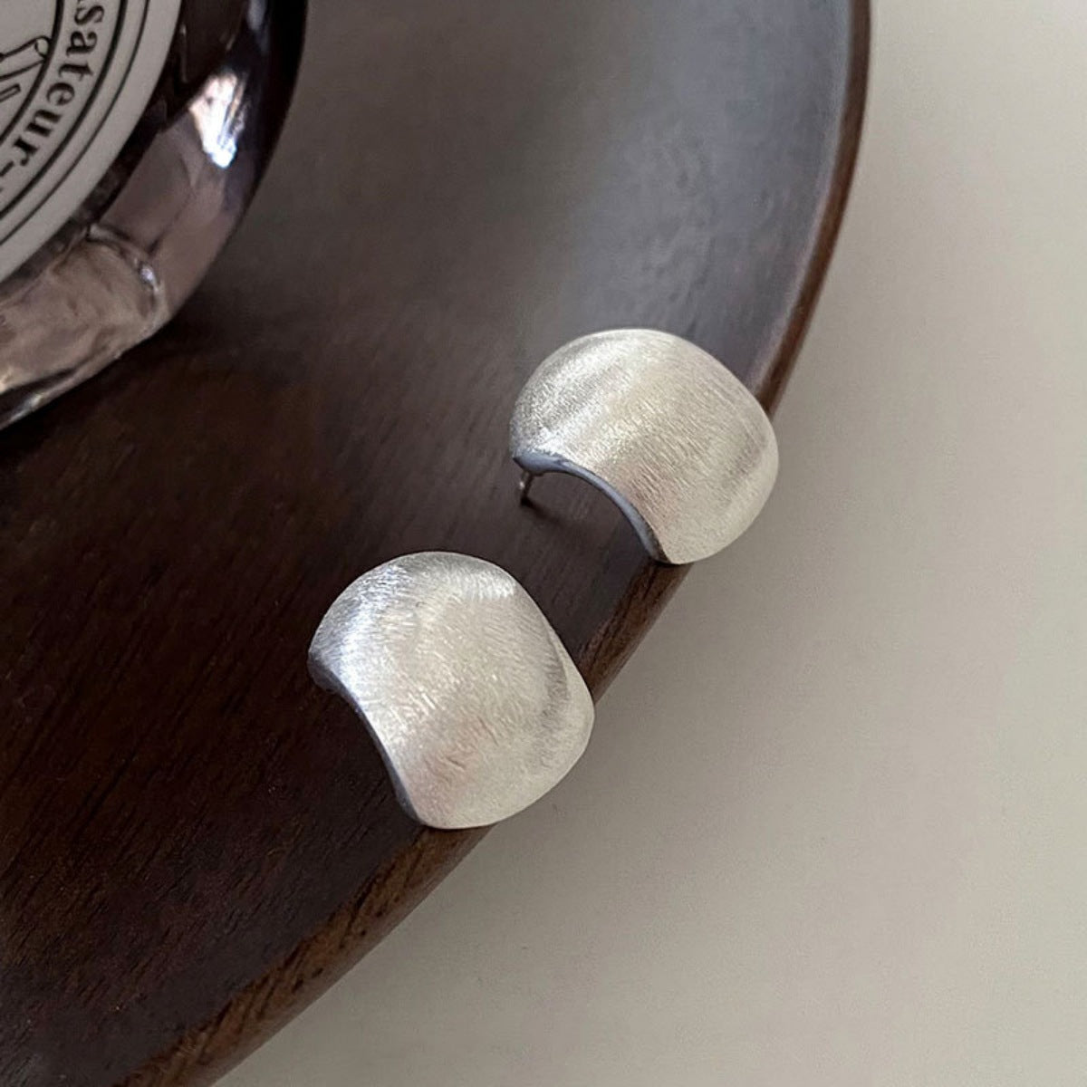 Sterling silver stud earrings shown as a pair