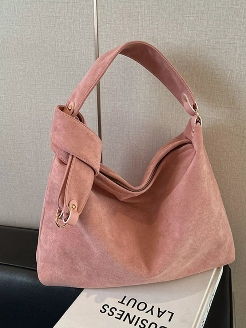 Soft pink suede hobo shoulder bag front view