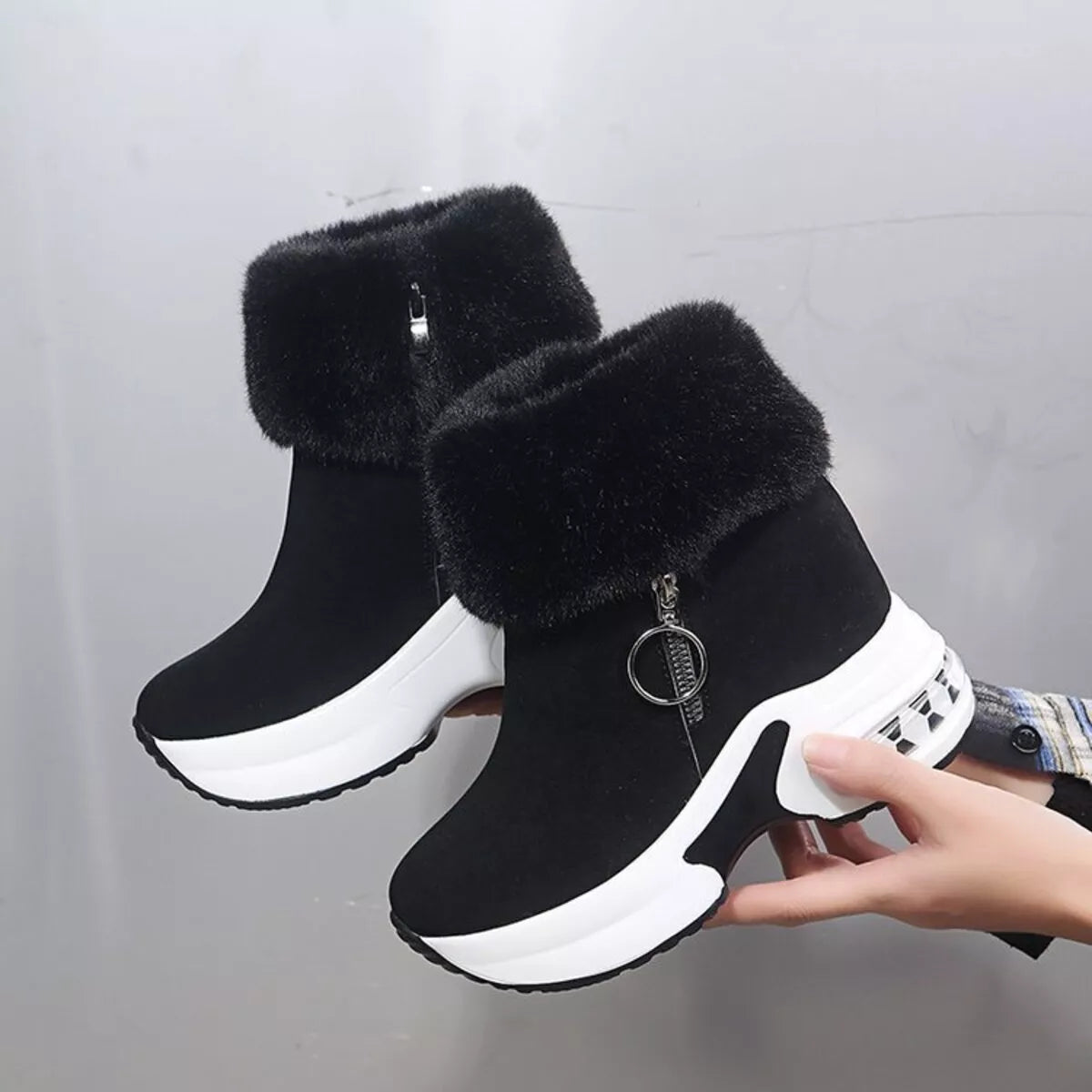 Fuzzy platform ankle boots styled with jeans