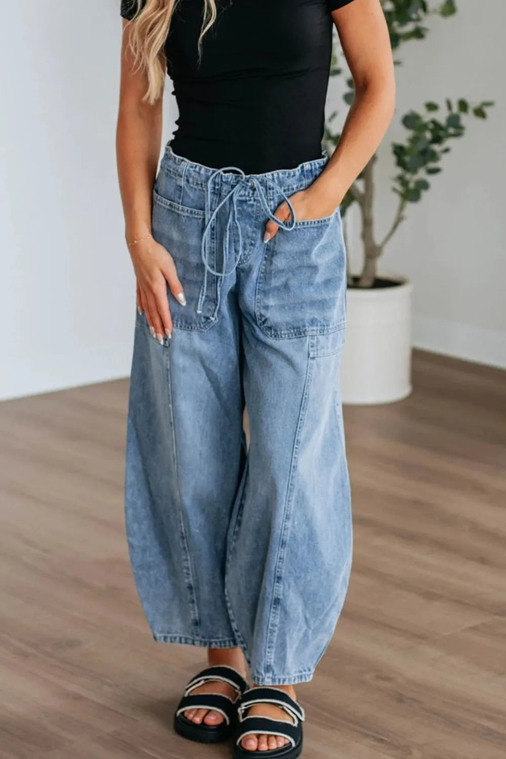 Drawstring waist detail on wide leg denim