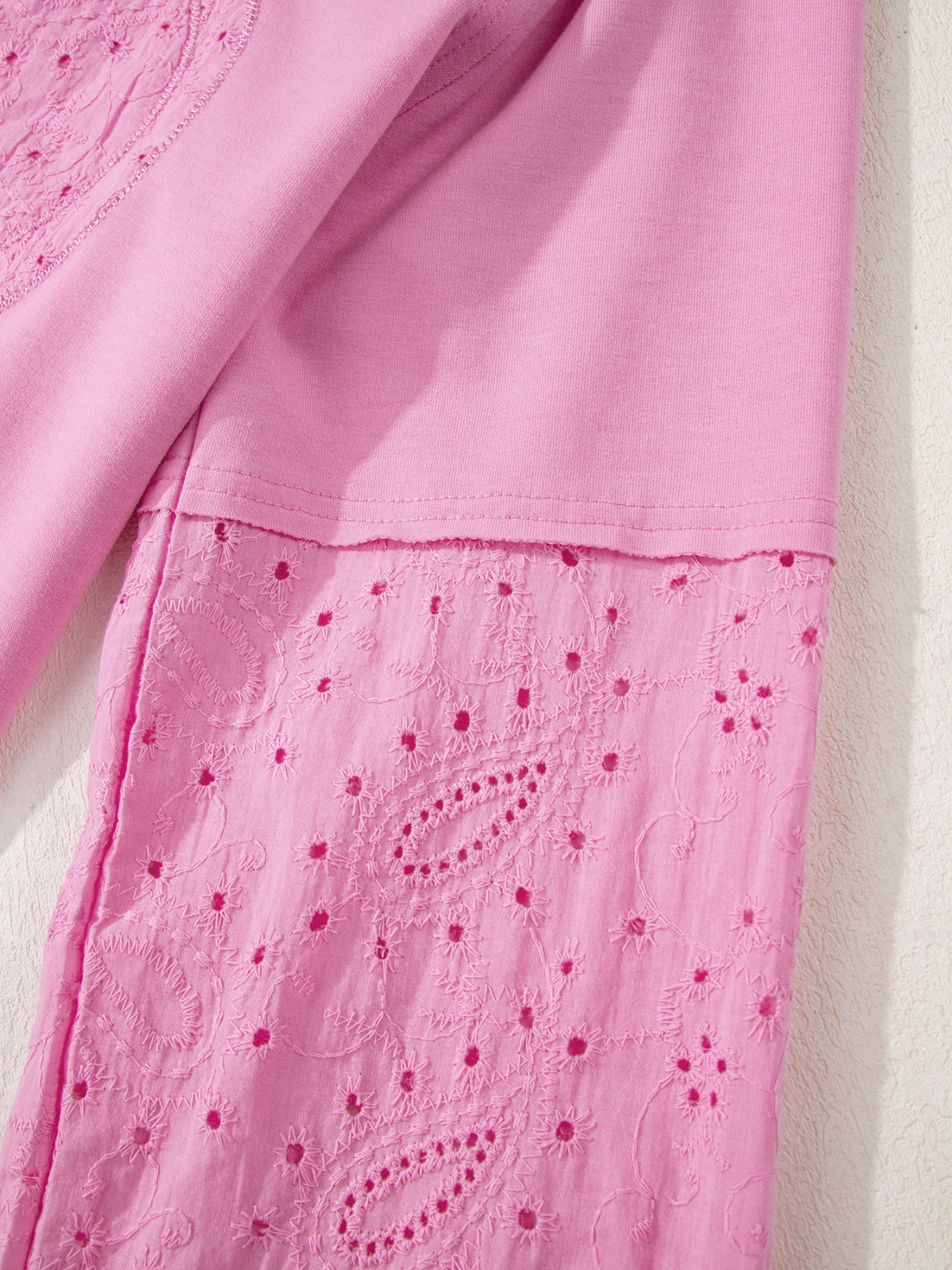 Pink top styled with denim