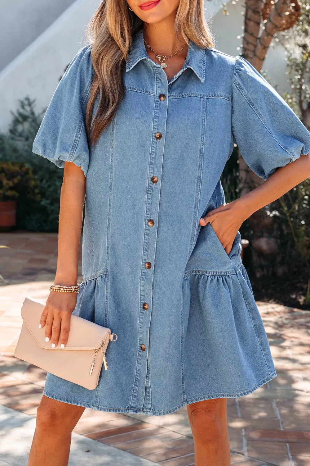 light wash puff sleeve ruffle hem denim dress front view