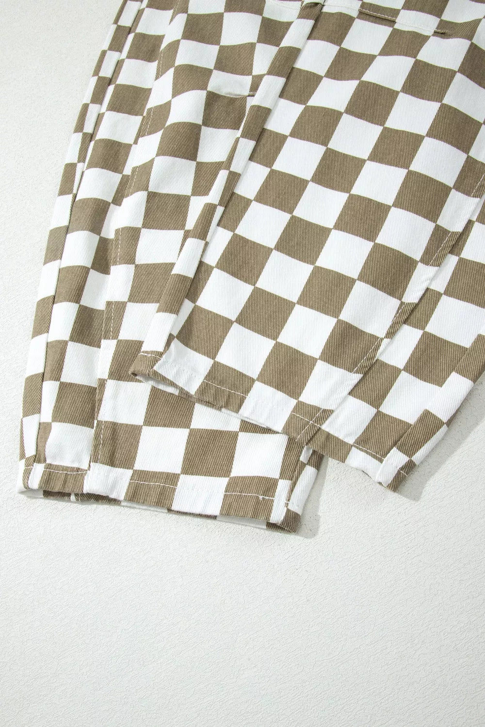Checkered denim pants pocket detail