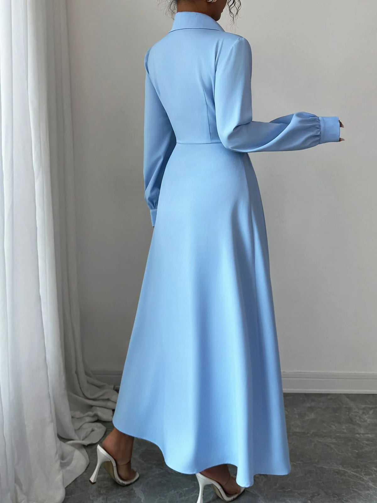 Full length back view of button front maxi dress