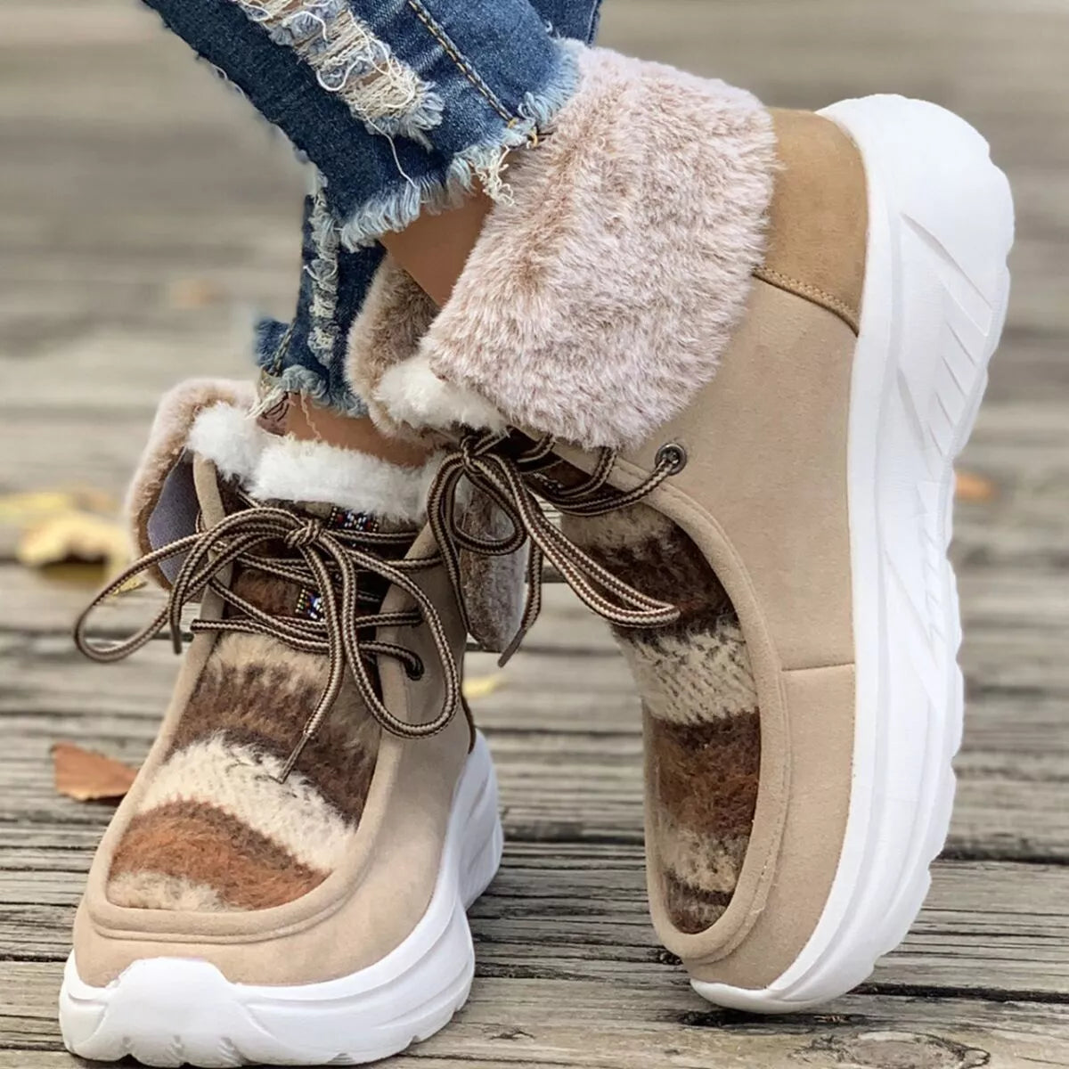 Warm fur lined ankle boots angled three quarter view