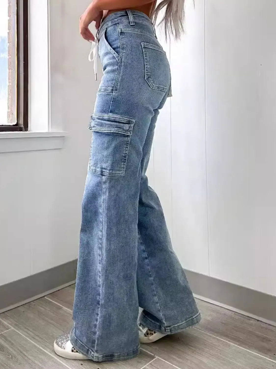 Straight jeans showing tie waist detail