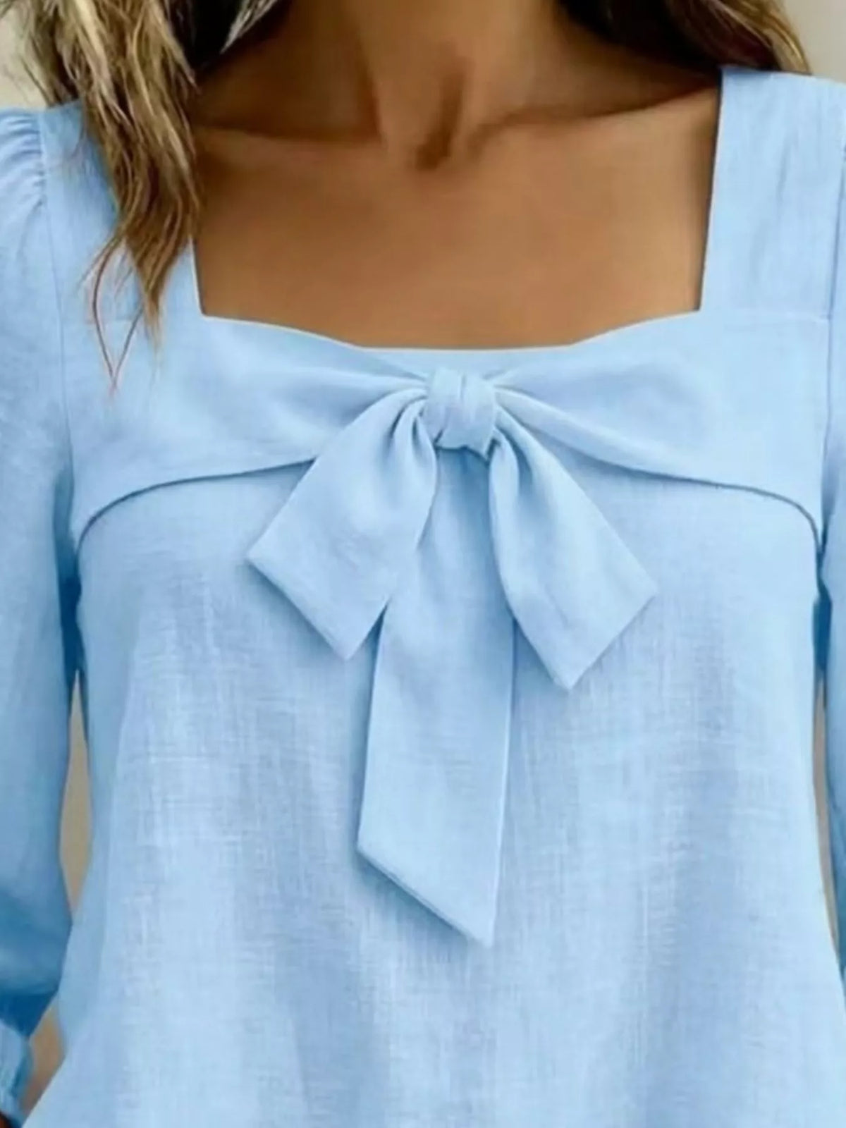 Bow front square neck blouse angled view